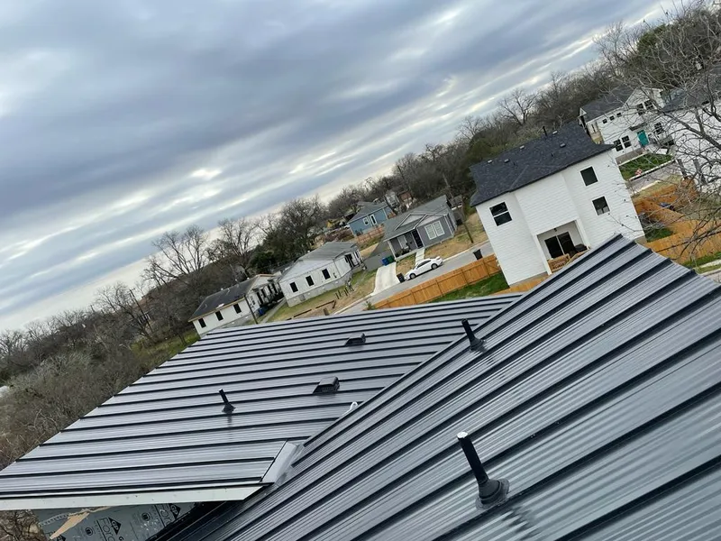 Standing seam metal roof panels with vents for Skylight Repair in Gaines